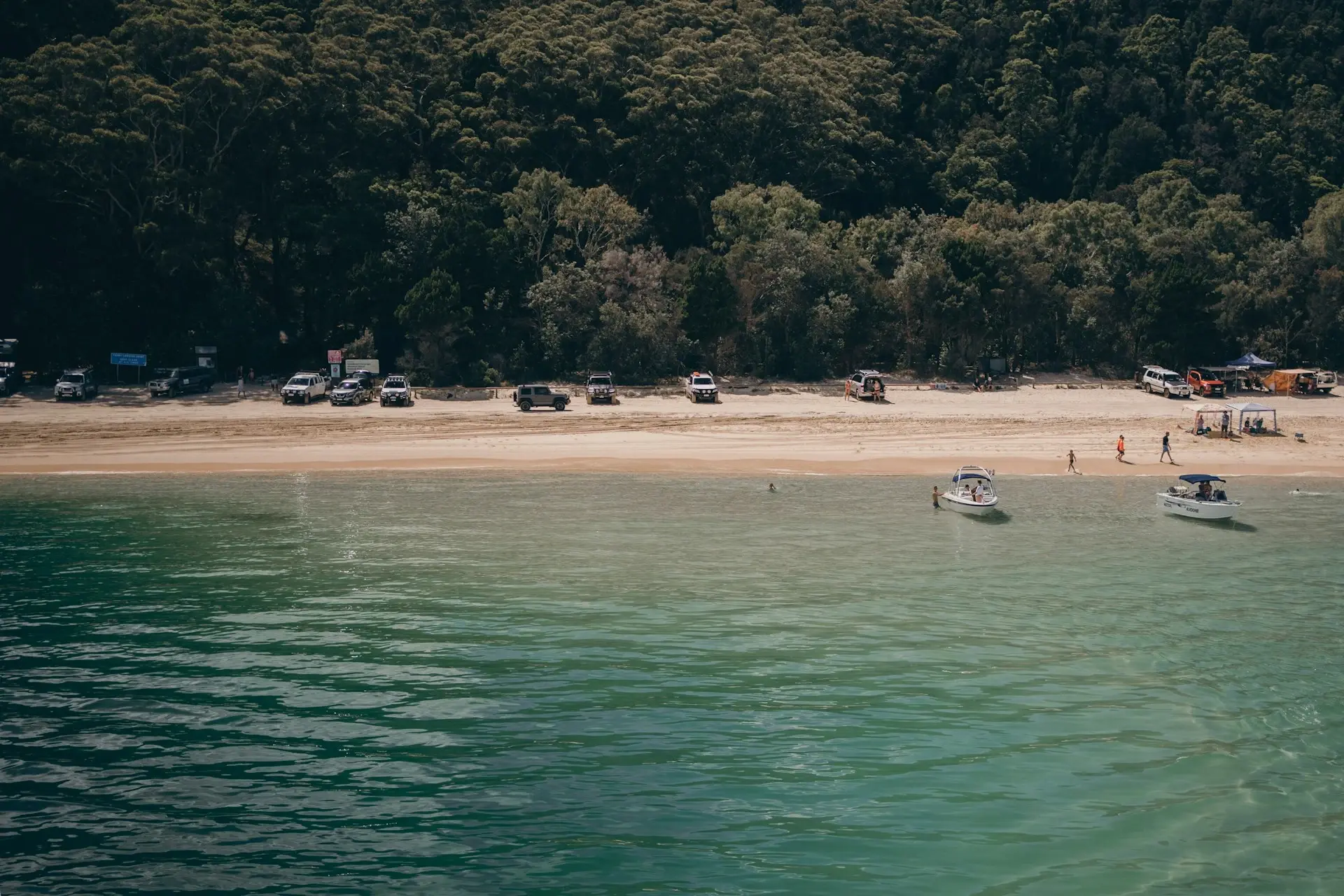 View of the 4WD and beach at Surfside Beach on Moreton Island