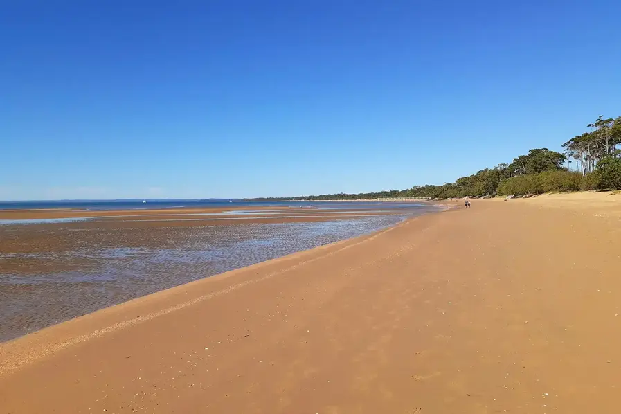 View of the sand at Pialba Beach in Hervey Bay on the Fraser Coast in Queensland, Australia