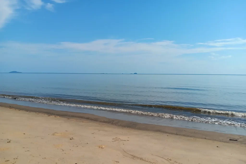 Beautiful calm waters of the Coral Sea at Bramston Beach in Tropical North Queensland