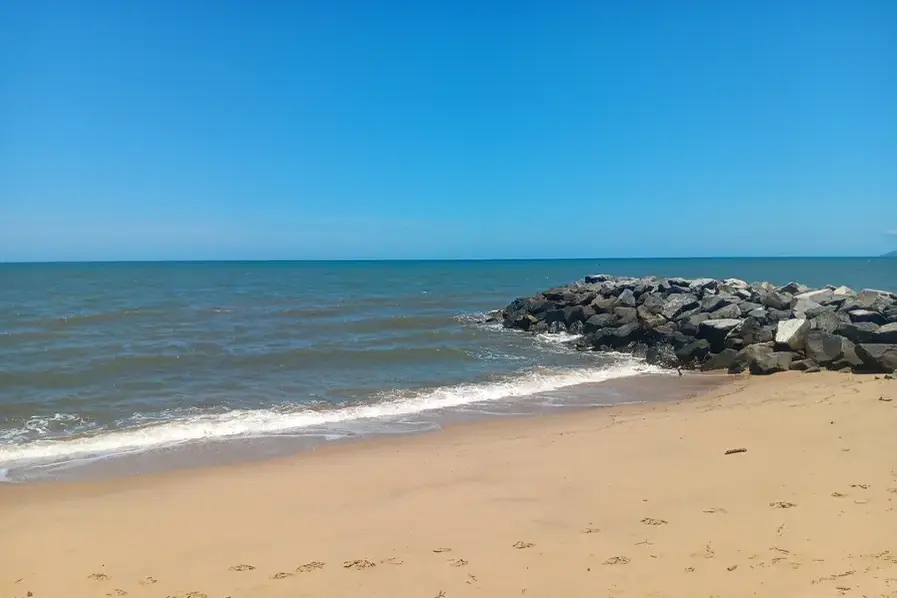 Beautiful blue waters of the Coral Sea at Holloways Beach near Cairns in Tropical North Queensland.