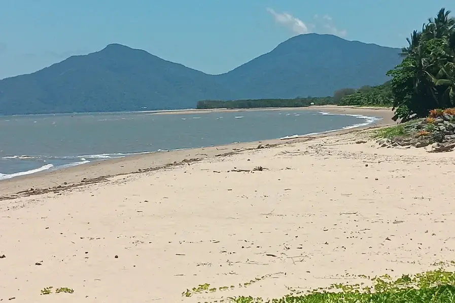 Full length view of Machans Beach in Tropical North Queensland