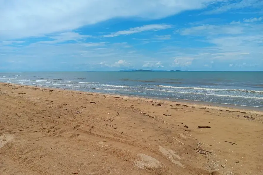 Looking out to the Coral Sea at Saunders Beach in Townsville, North Queensland, Australia